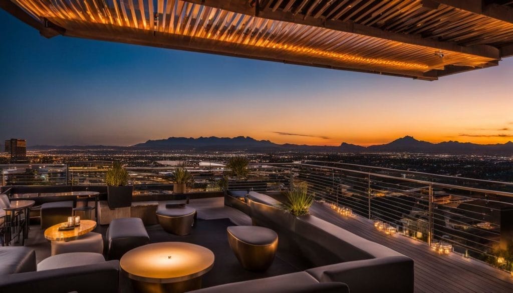 A rooftop bar with a view of the city at dusk.